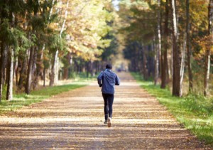 runner in the autumn forest